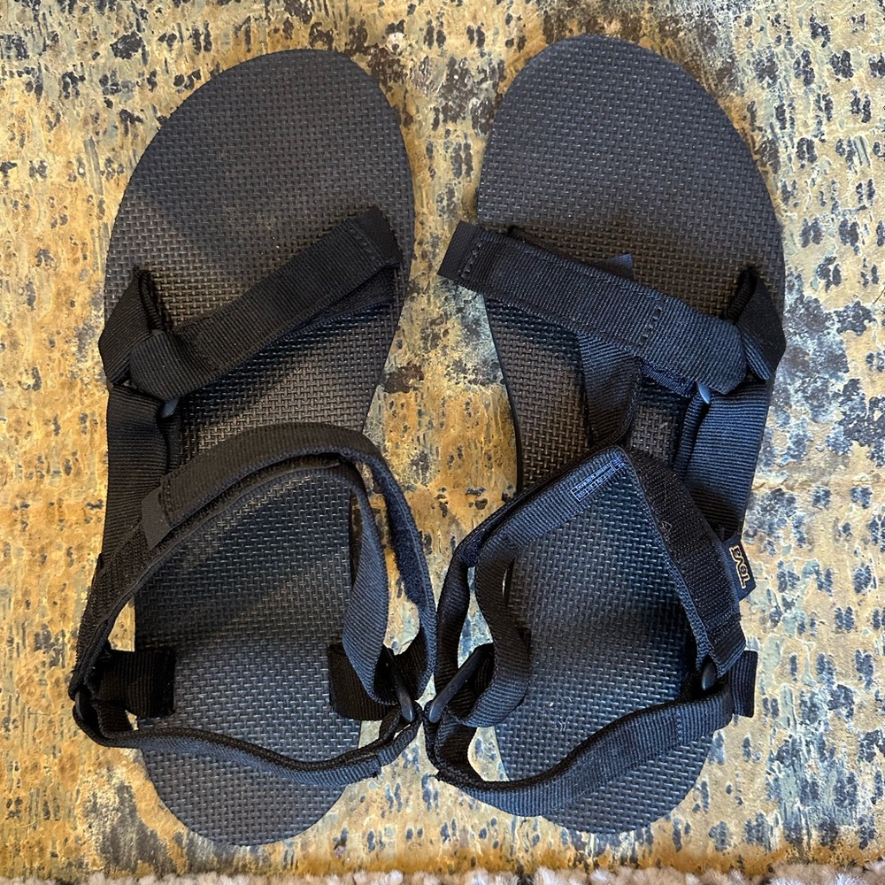 Black classic are a sandals.